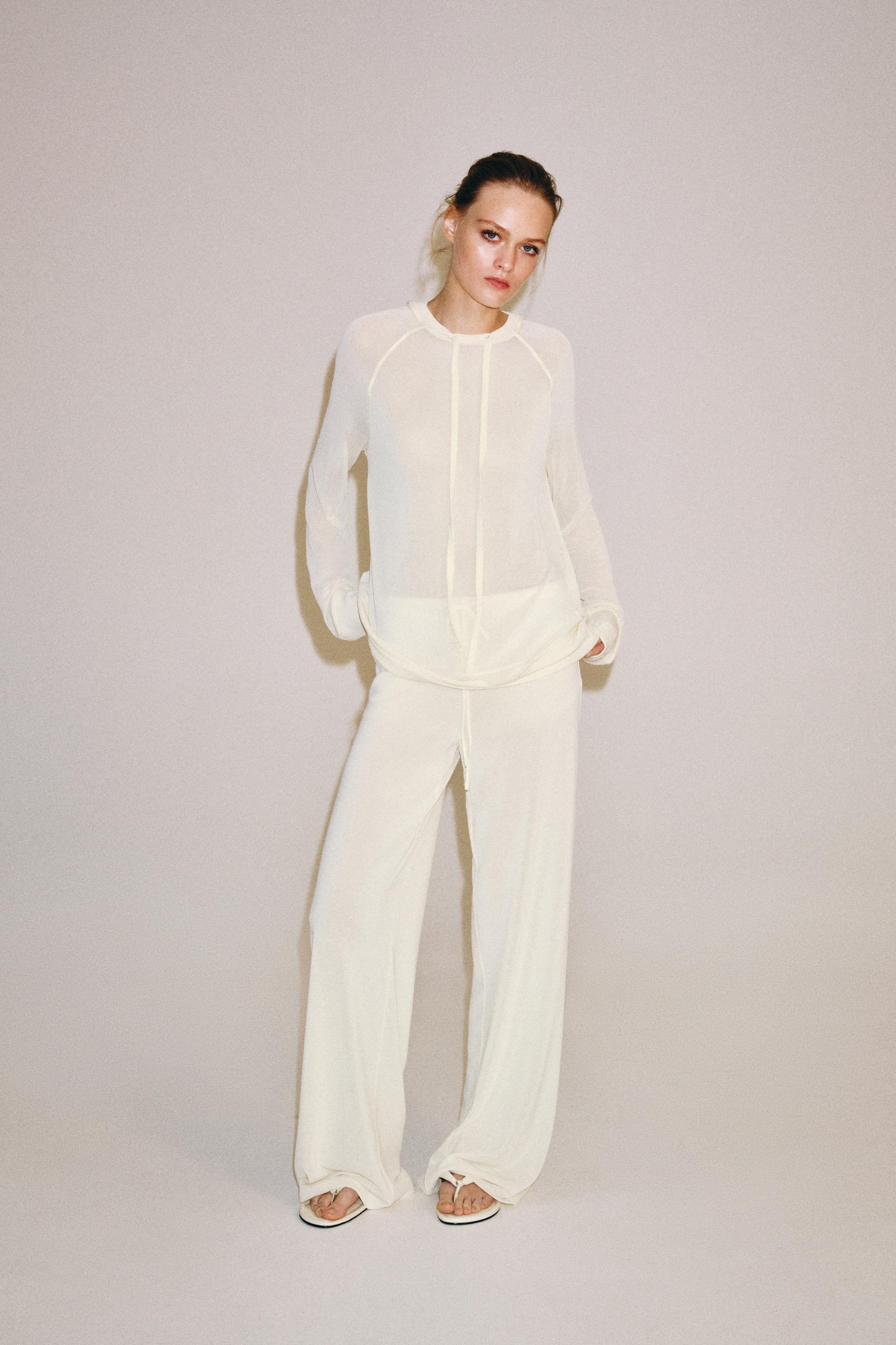 SEMI-SHEER FLOWY SWEATSHIRT